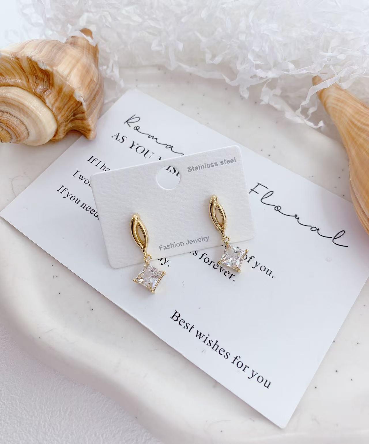 Gold Twist Drop Earrings